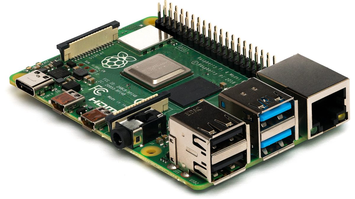 A Raspberry Pi 4 Model B single-board computer seen from the side, showing its USB and Ethernet ports.